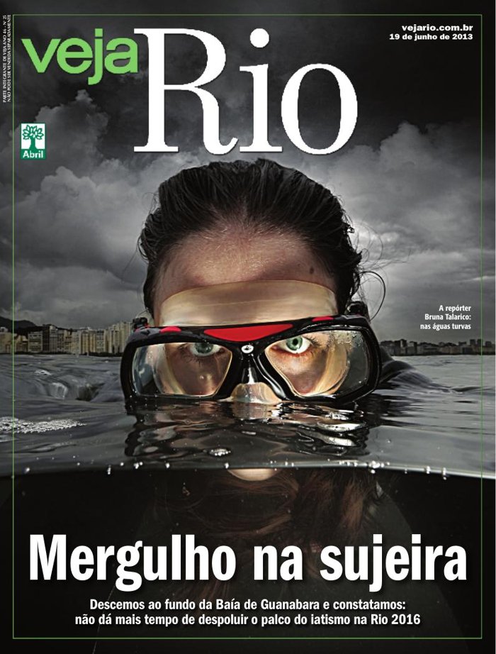 VEJA Rio cover — reporter Bruna Talarico in a diving mask emerging from the dark waters of Guanabara Bay